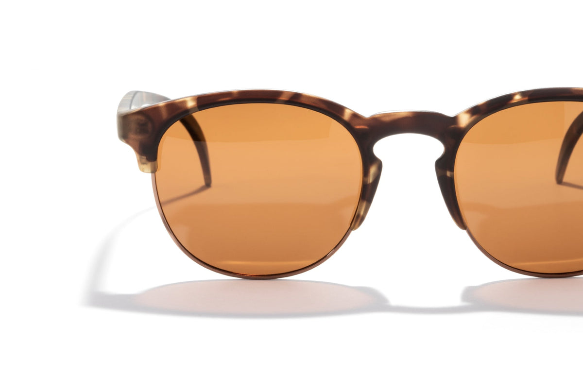 PROD_SUN_AV_TAM sunski avila tortoise amber close up right set front angle