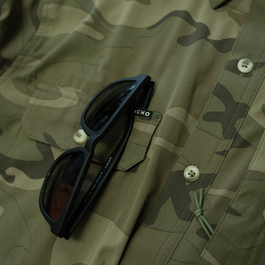 long sleeve camo shirt sunglasses 