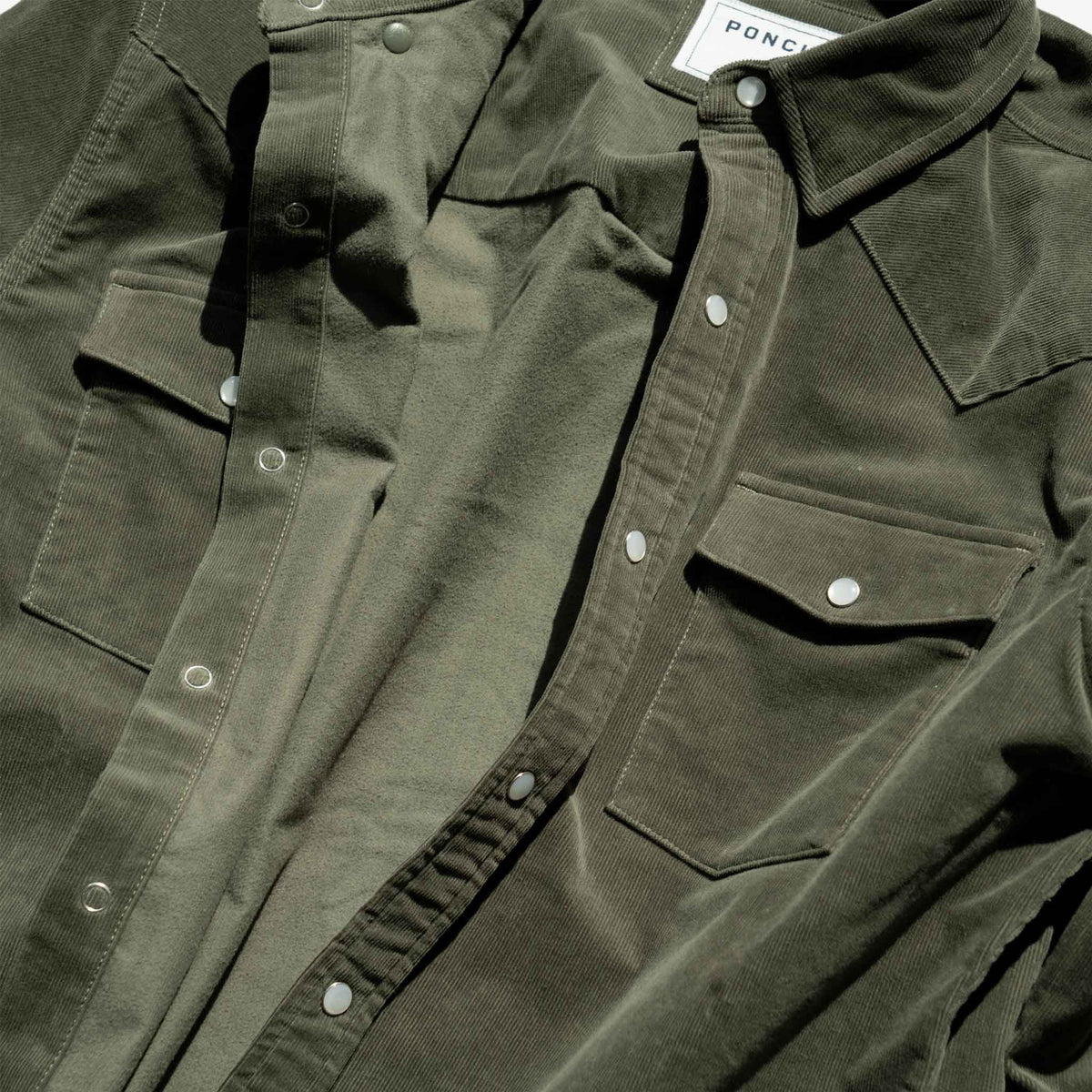 closeup of corduroy shirt open